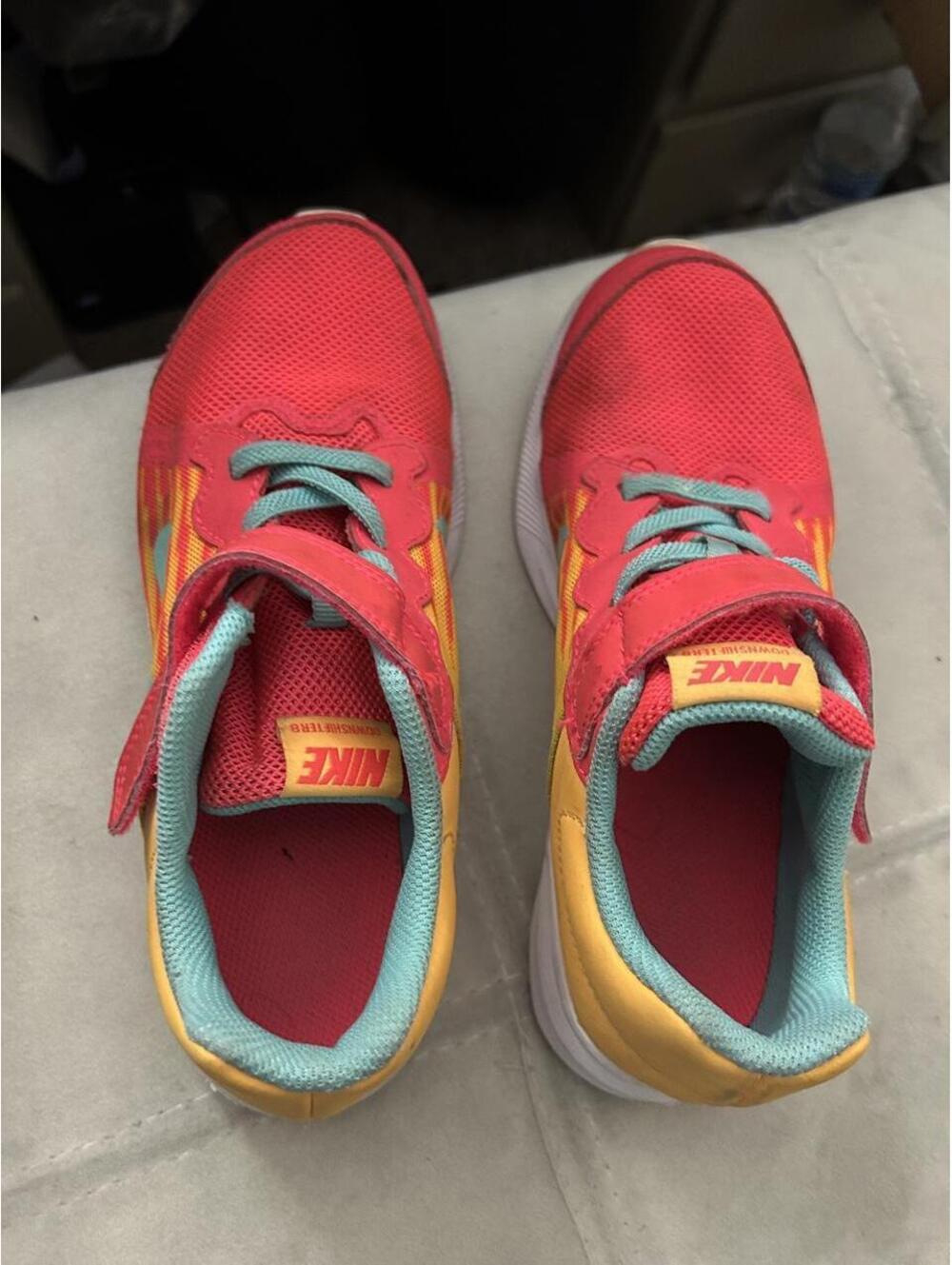 Nike kids sneakers in red, yellow, and teal with a teal Nike swoosh, size US 2 - Picture 5 of 7
